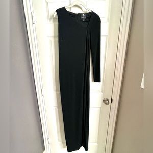 One-shouldered black floor length dress for a special occasion.